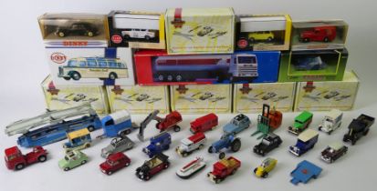 A quantity of boxed and un-boxed Matchbox, Dinky and Corgi vehicles.