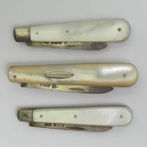 George Unite silver and mother of pearl fruit knife and two others.