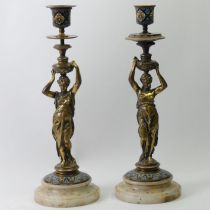 A pair of late 19th century French bronze and enamel candlesticks. 30 cm.