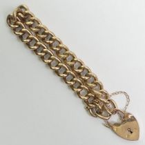 9ct rose gold hollow curb link gate bracelet, 12.7 grams, 9mm wide links.