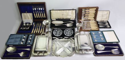 A box of silver plated boxed cutlery, serving tureens, vases and an entree dish.