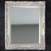 A silver framed bevel edged glass wall mirror. 63 x 53 cm.