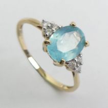 9ct gold blue quartz and diamond ring, 1.4 grams. Size N 1/2 8 mm wide.