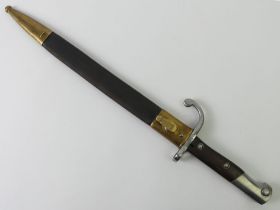 A Mauser bayonet by Weyersberg Kirschbaum & co in the original brass mounted leather scabbard. Blade