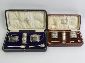 Two silver cruet sets, Birm.1921 and 1929, net weight 152 grams.