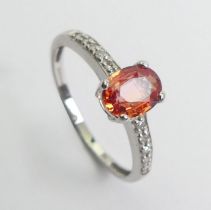9ct white gold orange sapphire and diamond ring, sixe N 1/2 6.7 mm wide.