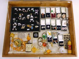 A jewellers display cabinet (45cm x 37cm) and contents including various silver earrings, pendants