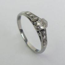 18ct and platinum diamond set ring, 1.7 grams. Size K 4.6 mm wide.