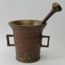 19th century bronze pestle and mortar. 12 cm.