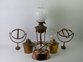A pair of N Braithwaite boat builders binnacle oil lamps together with an Art Nouveau oil lamp and a
