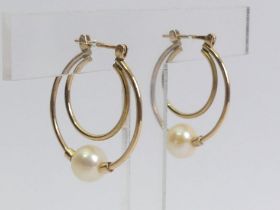 A pair of 9ct gold cultured pearl earrings, 5.4 grams,24mm x 28mm.