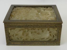 An old brass box inset with pierced jade panels. 11 x 5 cm