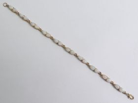 9ct gold opal bracelet, 6.6 grams, 18cm, 4.4mm.