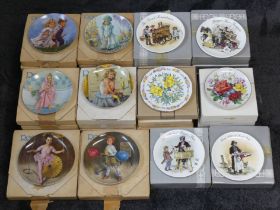 Thirty Bradford Exchange/Wedgwood china wall plates (boxed). Collection only.