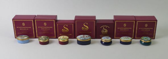 Seven Staffordshire enamel numbered annual edition trinket boxes from various countries including