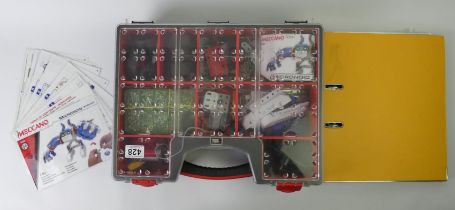 A modern mecanno set with a folder of model making instructions.