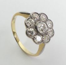 18ct gold platinum and diamond ring approximately 1 carat in total. Size L 12 mm in diameter.