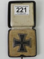 Iron Cross 1st class dated 1914, magnetic core, 800 silver frame with screws in the original case.
