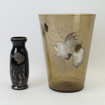 Two art Deco smoky glass vases overlaid in silver with fish designs. 21 and 16 cm.