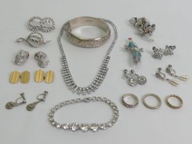 A silver hinged bangle, two 9ct gold rings, (4.7 grams), various marcasite and other jewellery.
