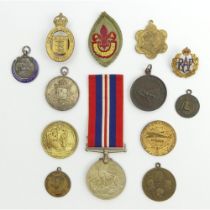Various medals and medallions inc. some silver examples.