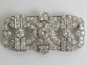 Platinum and diamond Art Deco brooch, centre stone approx 1ct flanked by two .5ct stones the rest