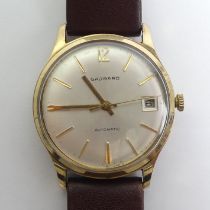 Garrard 9ct gold gents automatic movement date adjust watch, circa 1977.