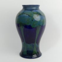 Large Moorcroft moonlit blue baluster vase, designed by William Moorcroft, C.1925, 33cm. Condition