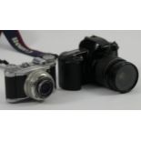 A Canon EOS 500 camera and an Altix Vebur camera.