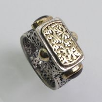 Asian silver and gold ring set with cabochon garnets, 7.1 grams, 13.26mm, size P.
