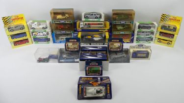 A box of boxed diecast cars including Corgi James Bond Aston Martin DB5, Corgi classic models.