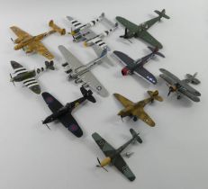 Ten unboxed diecast war planes.