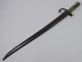 French Chassepot M1866 19th century bayonet and scabbard, the blade signed and dated 1869, blade