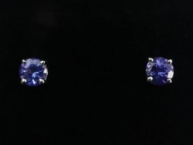 A pair of 18ct white gold tanzanite earrings, 4mm in diameter.