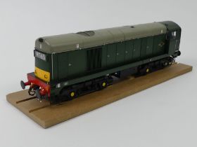 A boxed Heljan 0 gauge BR green and yellow panels class 20 diesel locomotive with DCC sound standing