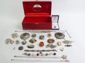 A jewellery box and contents including silver items.
