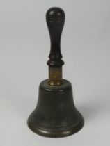 World War military issue hand bell, 27cm high.