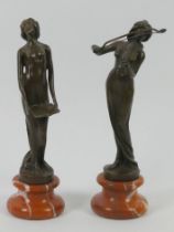 A pair of Art Nouveau style bronze figures on marble socles, 20cm.