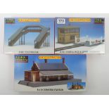 Three boxed Hornby Town & Country construction kits, R421 signal box and crossing R481 Dunster