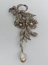 Sterling silver crystal set and faux pearl articulated floral design brooch, 32 grams, 90mmx 55mm.