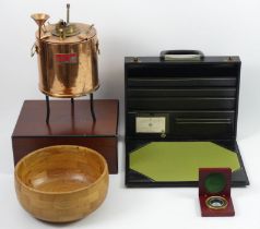 A walnut humidor, copper drum, compass, writing slope and a wooden bowl.