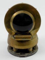 A brass ships compass. 15.5 cm high. Condition report: In working order.