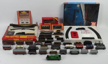 A quantity of 00 gauge including Hornby and Jouef train sets and boxed Hornby wagons.