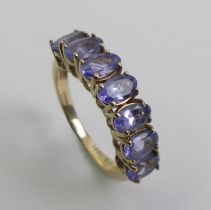 9ct gold tanzanite seven stone ring, 2.1 grams, 5.1mm, size J 1/2.