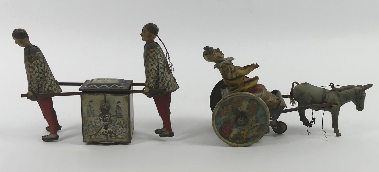 An early 20th Century DRGM clockwork tin plate horse and trap with clown driving together with a tin - Image 2 of 2
