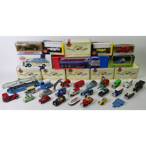A quantity of boxed and un-boxed Matchbox, Dinky and Corgi vehicles.