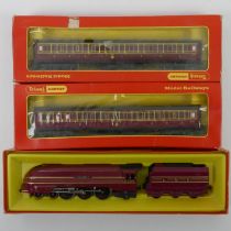 A Triang Hornby 00 gauge locomotive and tender "King George VI" together with two boxed Triang