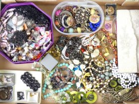 A box of mostly necklaces and pendants including a moss agate necklace.