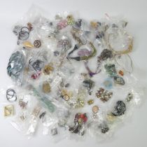 A collection of assorted costume jewellery including necklaces and brooches.