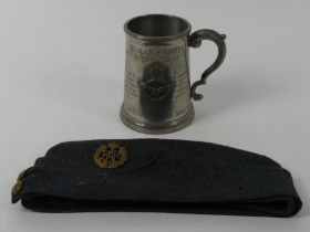 An RAF WWII side cap with badges together with a pewter Battle of Britain tankard, 13cm.